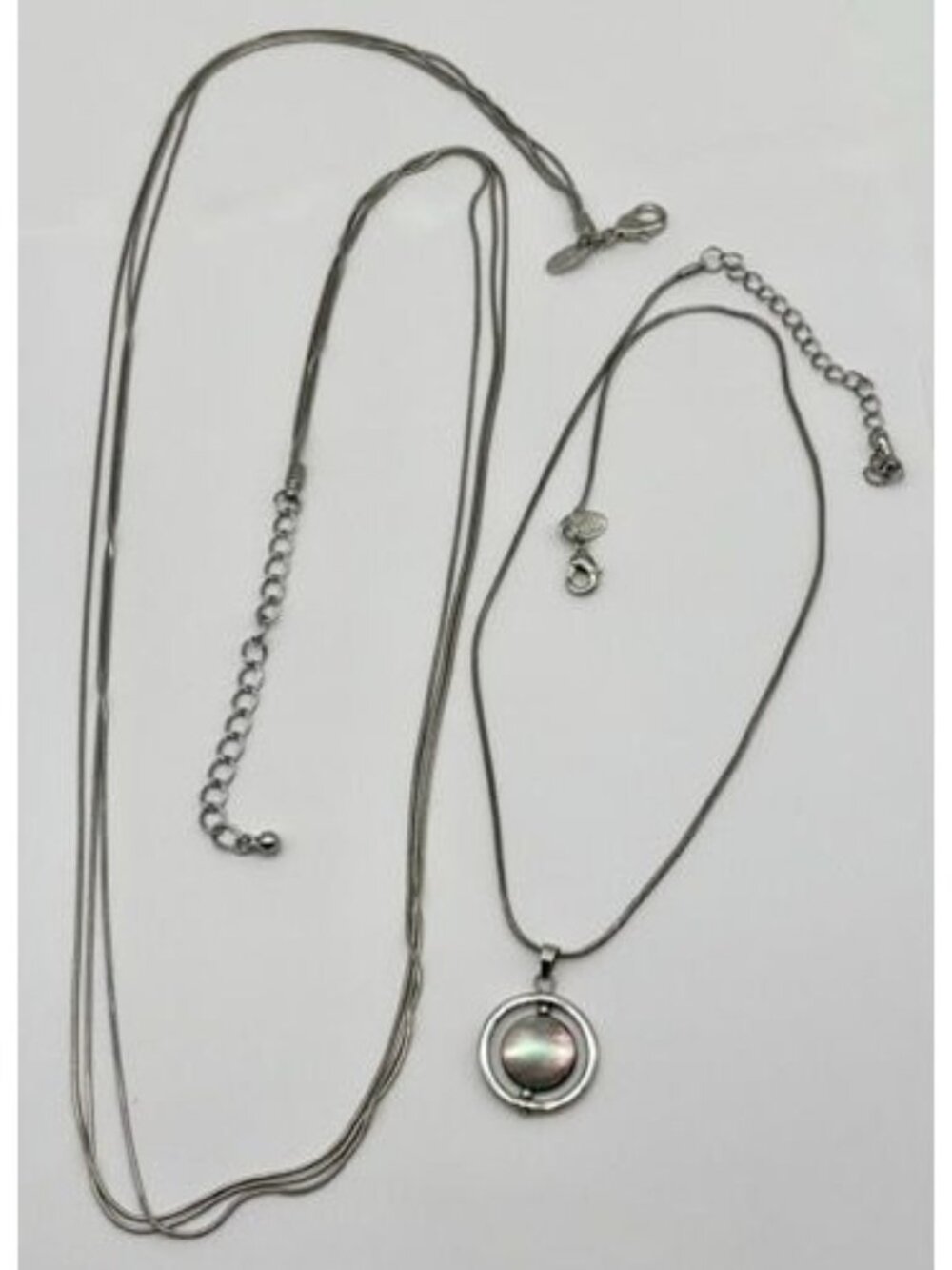 Set of Two Lia Sophia Silver-Tone Long Necklaces, One With Shell Spinner Pendant